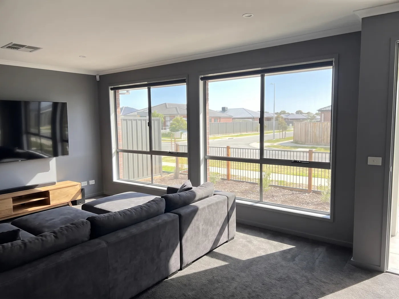 Before — the same room with bare windows