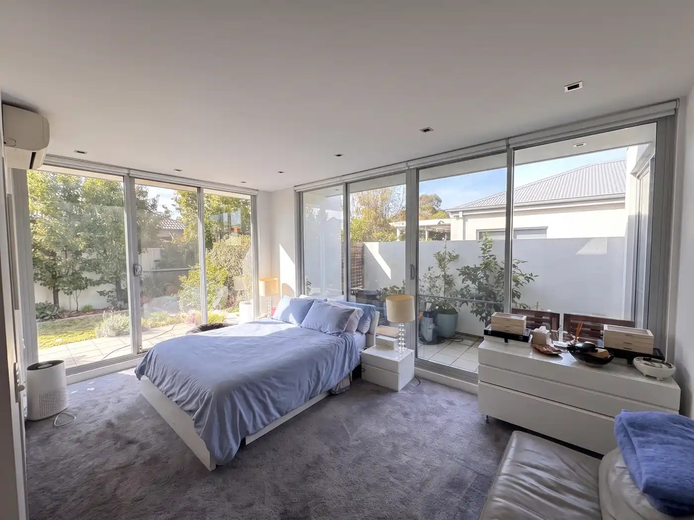 Before — the same room with bare windows