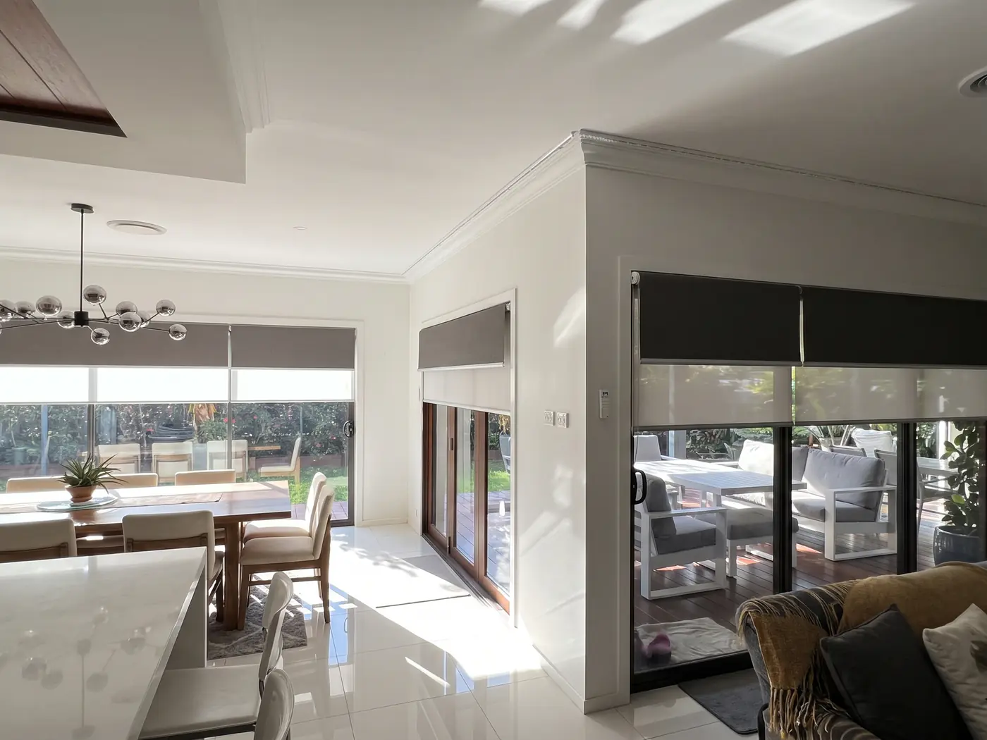 After — Every opening, one matched set, roller blinds by Crown Curtain and Blind