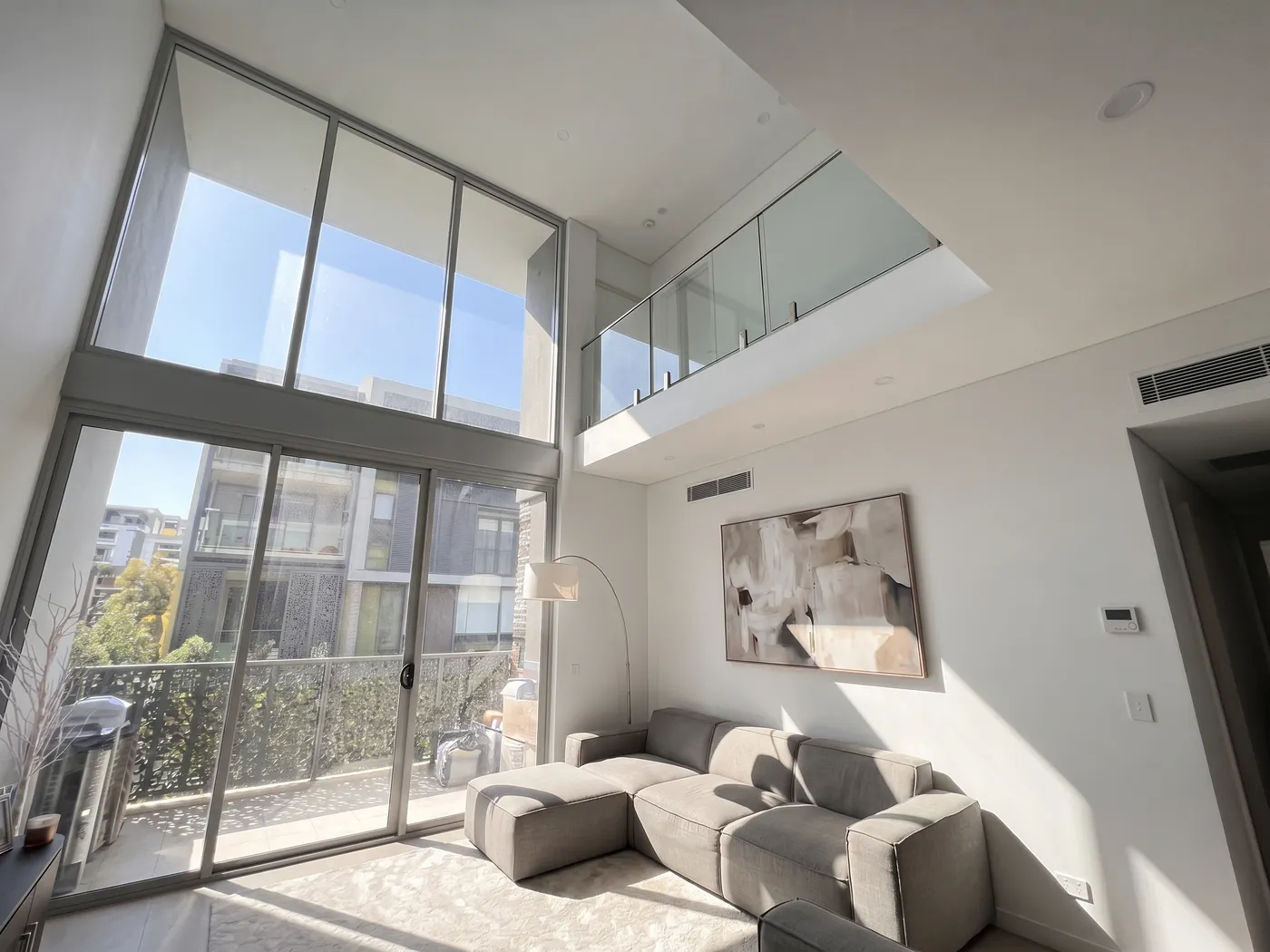 Before — the same room with bare windows