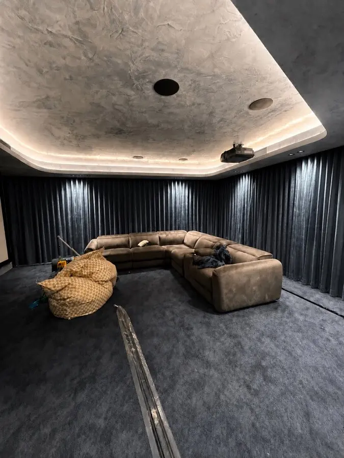After — Sydney home cinema fitted with full-wall blockout curtains by Crown Curtain and Blind